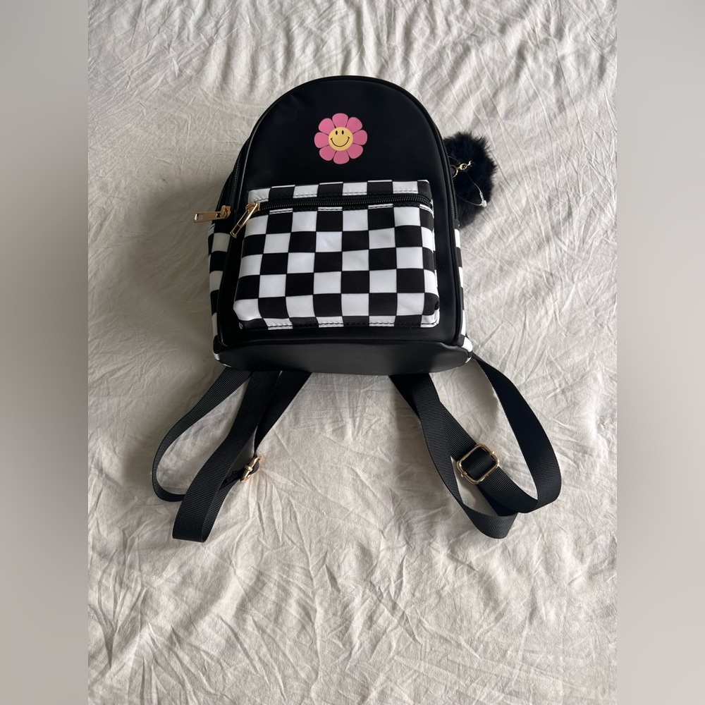 Like Dreams Backpack Women's Black w/ Black White Checkered Adjustable straps.